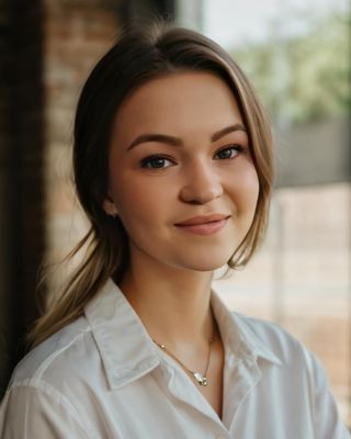 Photo of Emily New, Counsellor, MA, RCC