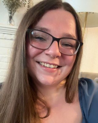 Photo of Riley Caporale, Master Social Worker, LLMSW