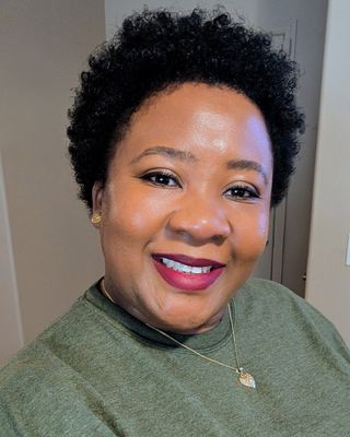 Photo of Olayinka Okin, Marriage & Family Therapist, LMFT