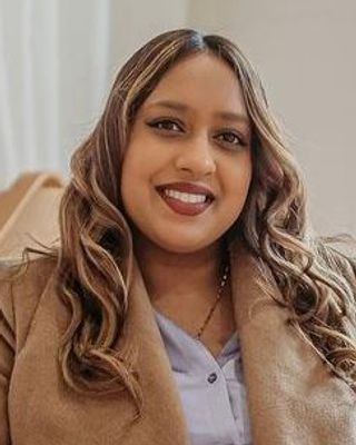 Photo of Ameena Marsh, MA (IP), RSSW, RP (Q), Registered Psychotherapist (Qualifying)