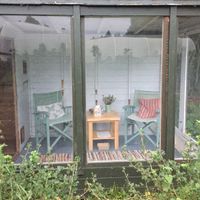 Gallery Photo of We have indoor and outdoor counselling spaces at The Garden. This one overlooks the blackcurrant bushes.