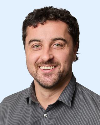 Photo of Jon Glavinas, Counsellor, ACA-L1