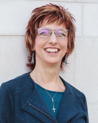 Photo of Karen 'kc' Carroll - Karen "KC" Carroll, Licensed Professional Counselor, CNM, (ret), MS, MA