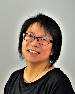 Photo of K. Carol Siu, MACP, CCC, CHyp, CCC-S, Counsellor in Calgary