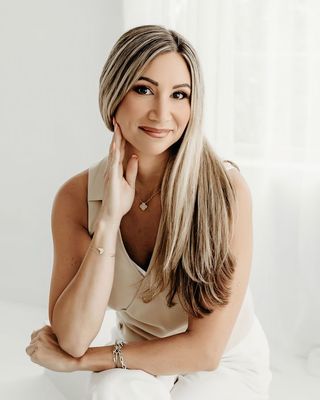Photo of Emily M Flores, Counselor, LCPC, PhD, CEO