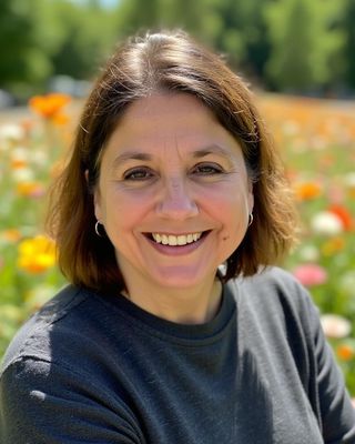 Photo of Cathleen Menda, Counselor, LMHC