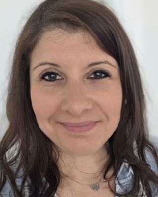 Photo of Tami Oommen, Counselor, LMHC