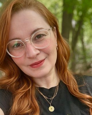 Photo of Nina Santiago - Nina Santiago | Inclusive & Integrative Therapy, Registered Psychotherapist (Qualifying), PhD, MACP