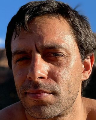 Photo of Julian Kaval, Counselor, LMHC