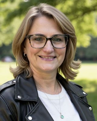 Photo of Kiki Abbott Moore, Registered Psychotherapist, M.S, RP, CATA