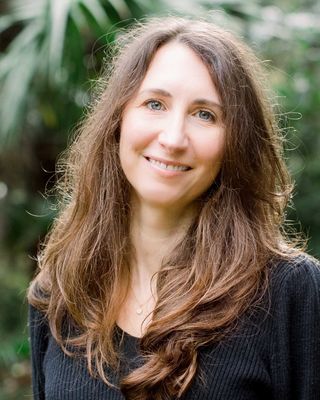 Photo of Claira Ford, LPC, LMHC, RPT™