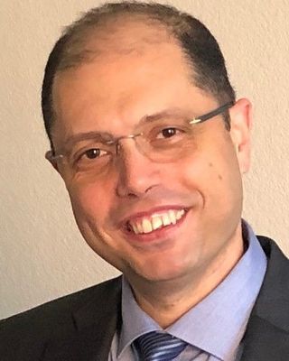 Photo of John MELEK, MD, MSc.