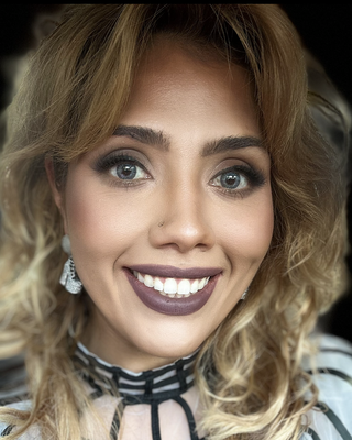 Photo of Madeleine Reyes, Psychiatric Nurse Practitioner, APRN, PMHNP, DNP