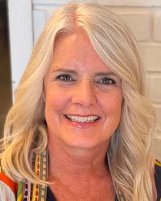 Photo of Carolyn Smith, Licensed Professional Counselor, LPC, CTP, RYT