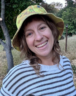 Photo of Reina Reis, Marriage & Family Therapist Associate, MA, AMFT, APCC