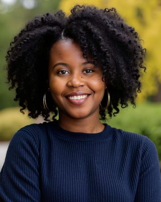 Photo of Mirlande M. Dickinson, Registered Psychotherapist (Qualifying), BSW, RSW, MA, RP-Q