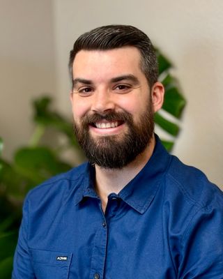 Photo of Corey Thompson, Counselor, LPCC, CIMHP