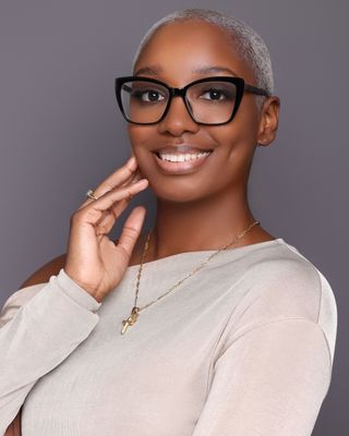Photo of Tae’Sia Hall, Licensed Clinical Mental Health Counselor, LCMHC, LCAS-A