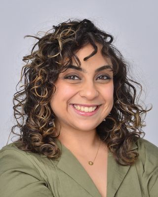 Photo of Dina Helale, Registered Psychotherapist (Qualifying), MACP