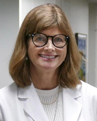Photo of Suzanne E Watson, Psychiatrist, MD, MDiv, MEd