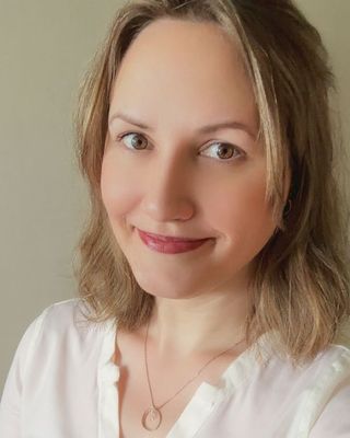 Photo of Asheley Korf, Counselor, MS, LIMHP, LPCC