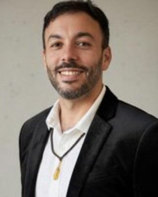 Photo of Juan Carlos Martell, Licensed Mental Health Counselor, LMHC