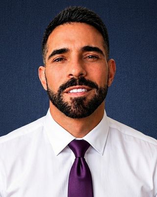 Photo of John D Moore, Counselor, PhD, MBA, CADC, CHT