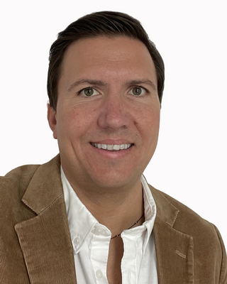 Photo of Dr. Blake Suzelis, Counselor, PhD, LMHC, RH, CMHS, NBC-HWC