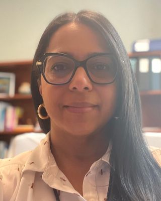 Photo of Judith Molina, MS, LMHC, QS, Licensed Professional Counselor