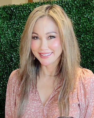 Photo of Dr. Elizabeth Newman, Psychological Associate, PsyD, MA, BCC, AP, CH