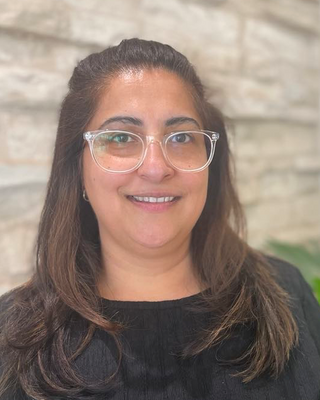 Photo of Kiran Mudhar, Counsellor, MNCPS Acc.