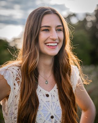 Photo of Dr Cloie Parfitt, Psychotherapist, PhD, MBACP
