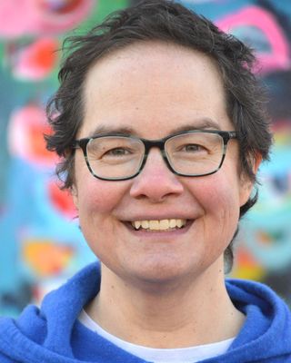 Photo of Gina M. Baird, Counselor, LMHC, ATR-BC, ATCS