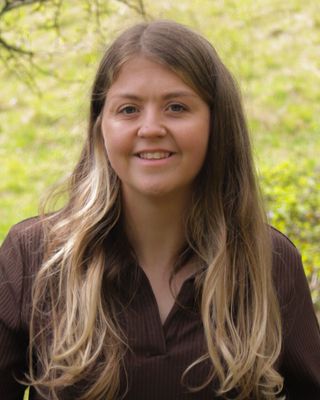 Photo of Abi Hutchinson, Psychotherapist, MA, MBACP