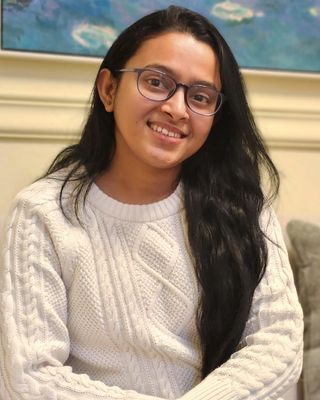 Photo of Mousumi Saha, Registered Psychotherapist, MSc, Mphil