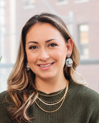 Photo of Steph Paolucci, Registered Psychotherapist, MA, RYT