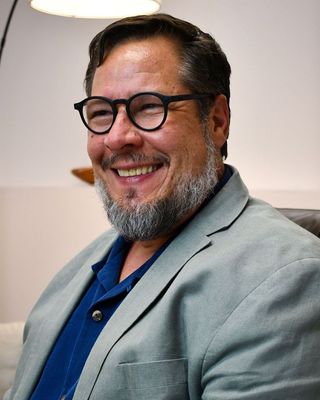 波多黎各心理学家Gustavo Guevara Garisoain博士的照片
