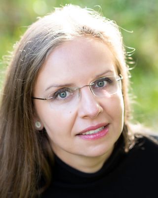 Photo of Andreea Weisl-Shaw, Psychotherapist, PhD, MBACP Accred