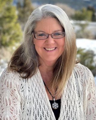 Photo of Julie Anne Martin, Licensed Professional Counselor, MA, LPC, DVM