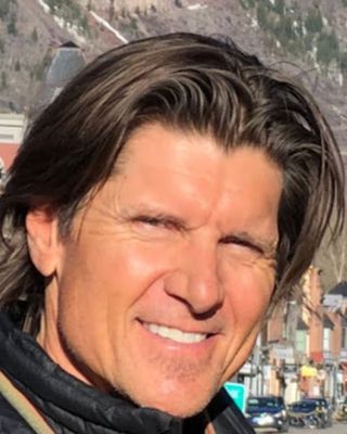 Photo of Rowlie Busch, Counselor, MEd, CMHC, LPC, NCC