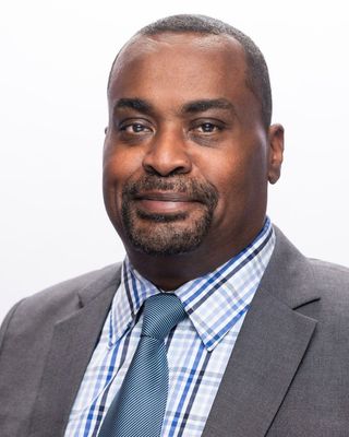 Photo of Yerodin Lucas, Licensed Social Worker, PhD, LSW