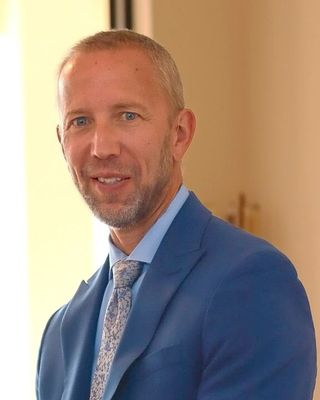 Photo of Dr. Tom Grebouski, Counselor, PhD, LCMHC