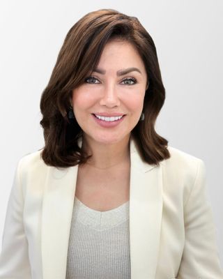 Photo of Dr. Clara Alvarez, MD, FAPA, Psychiatrist