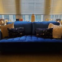 Gallery Photo of The interior of the office has a relaxing and safe feel, an extremely comfortable couch, large windows, crystals, and diffuser for aromatherapy. 