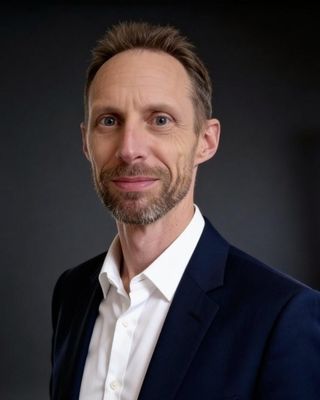 Photo of Elliott Humphries, Counselor, MA, LCMHC-A, LCAS-A