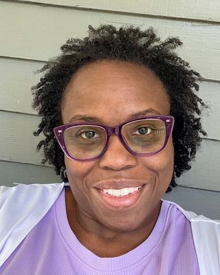Photo of Aisha Burton, Licensed Clinical Mental Health Counselor, MEd, MS, LCMHC