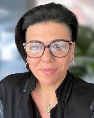 Photo of Paola DI Grazia, Counselor, LMHC
