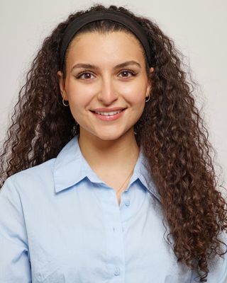 Photo of Aya Kabrit, Registered Psychotherapist (Qualifying), B.A, M.Ed