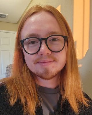 Photo of Austin Randall, Pre-Licensed Professional, MA, (They, He)