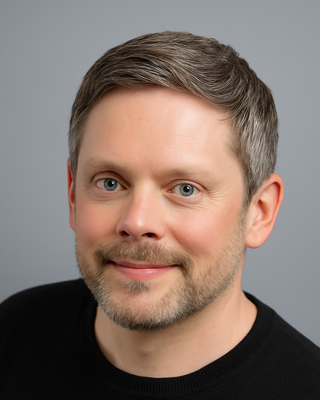 Photo of Aaron Karmin, Counselor, LCPC